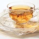 Tea / teabag dream meaning – image of a steaming cup of tea with a teabag representing comfort, relaxation, and healing in dreams.